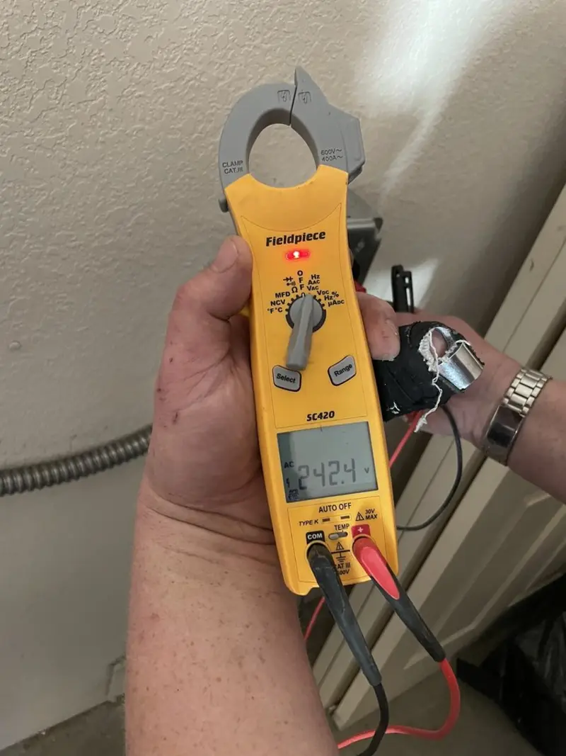Voltage testing with clamp meter during Generator Installation in Crockett